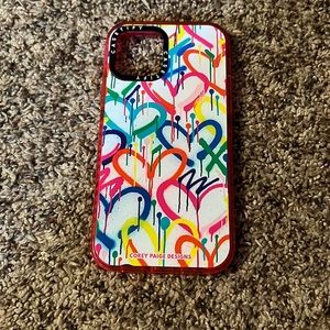 Newly used neon heart hard shell iPhone 12 Pro case.